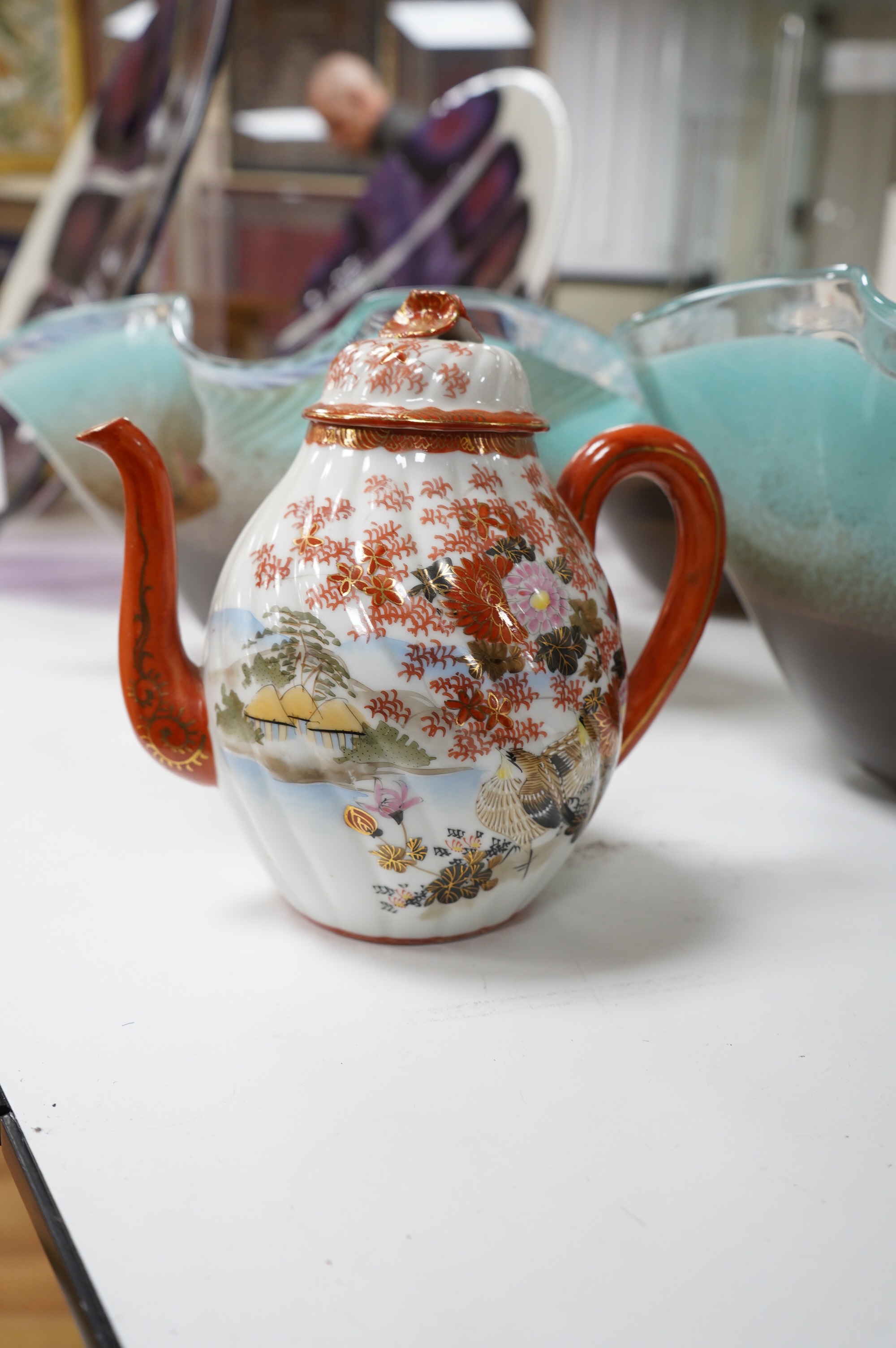 A Japanese egg shell porcelain tea set to include teapot, trios and milk jug. Condition - a few minor breakages, mostly good